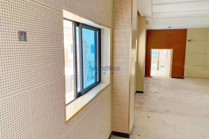 Installation of Perforated Acoustic Panels in the school's hallway classrooms