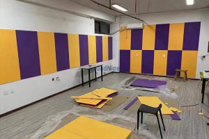 Installation of PET acoustic panels in music room 